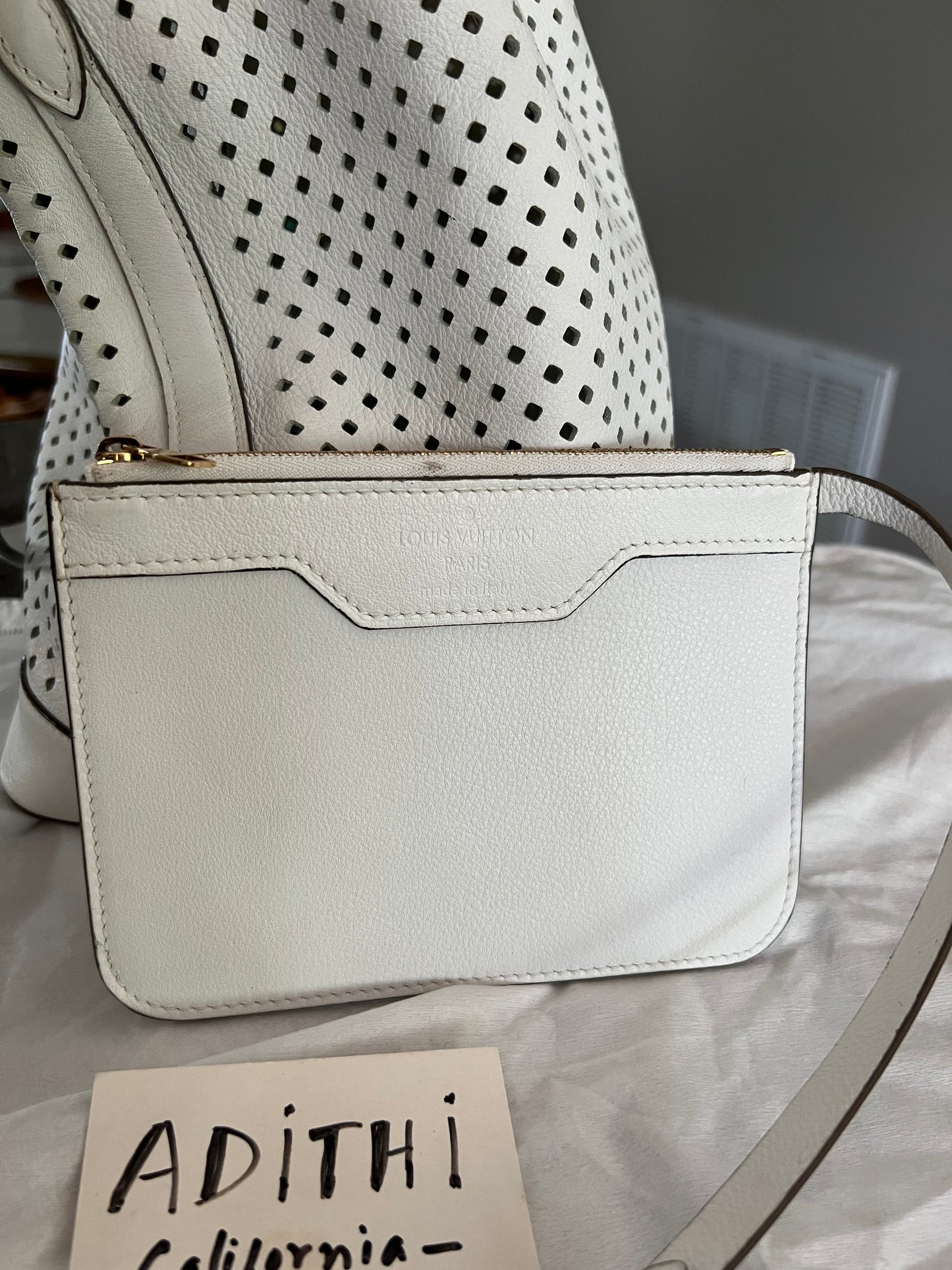 Noe Perforated White with Pouch