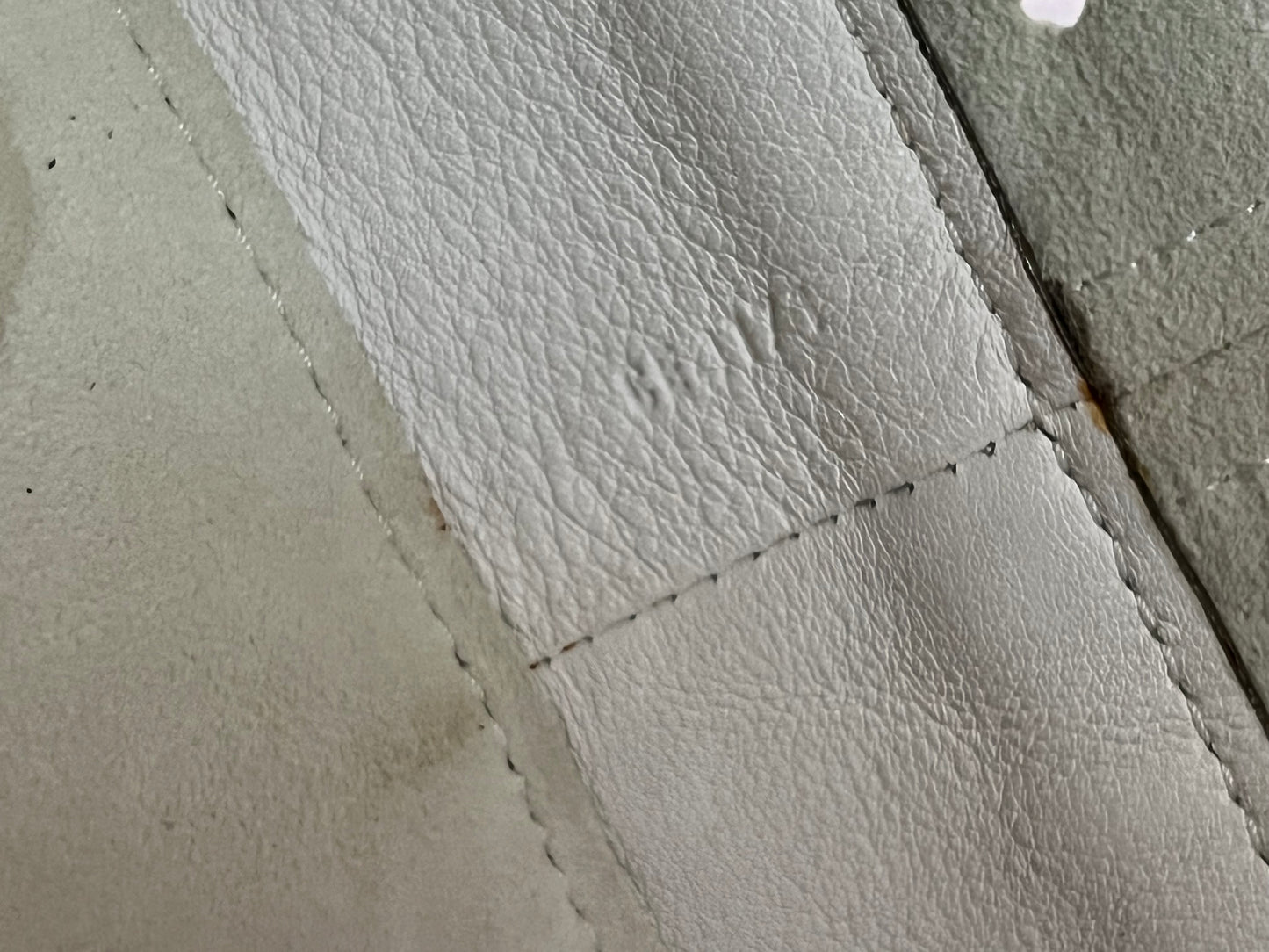 Noe Perforated White with Pouch