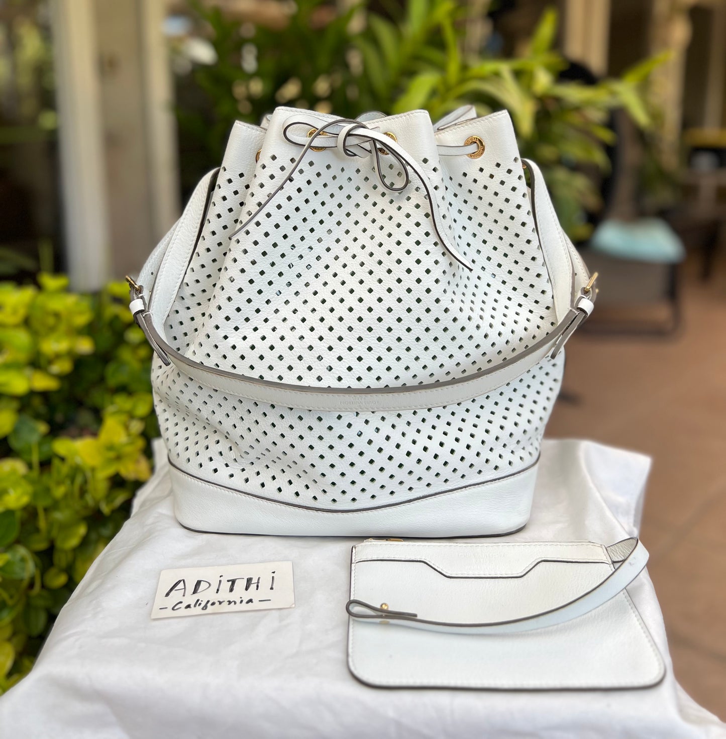 Noe Perforated White with Pouch
