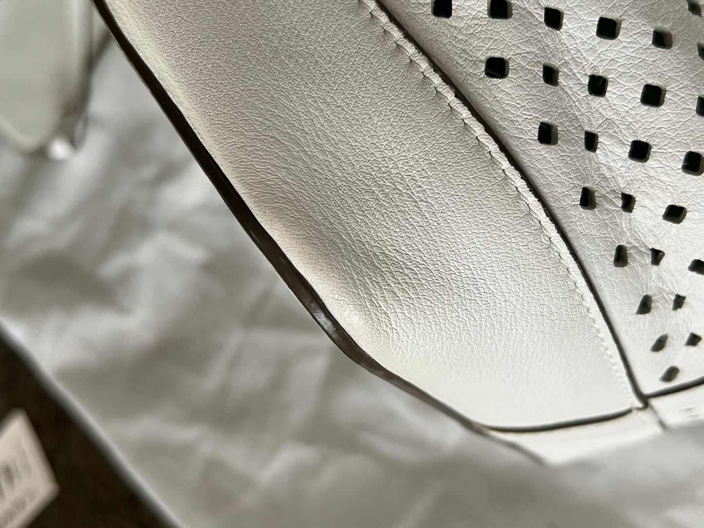 Noe Perforated White with Pouch