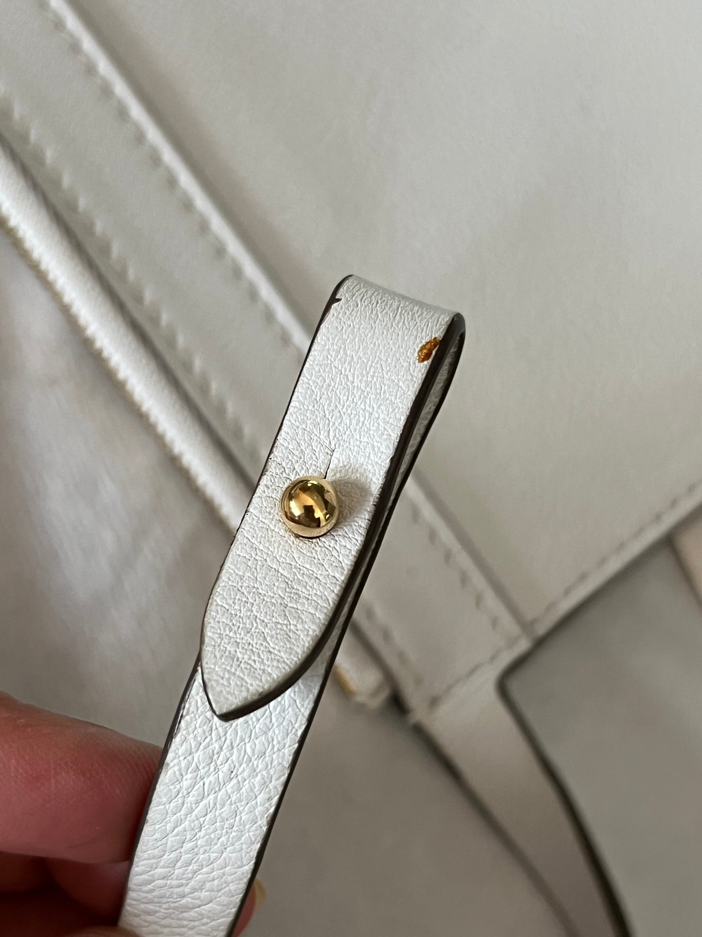 Noe Perforated White with Pouch