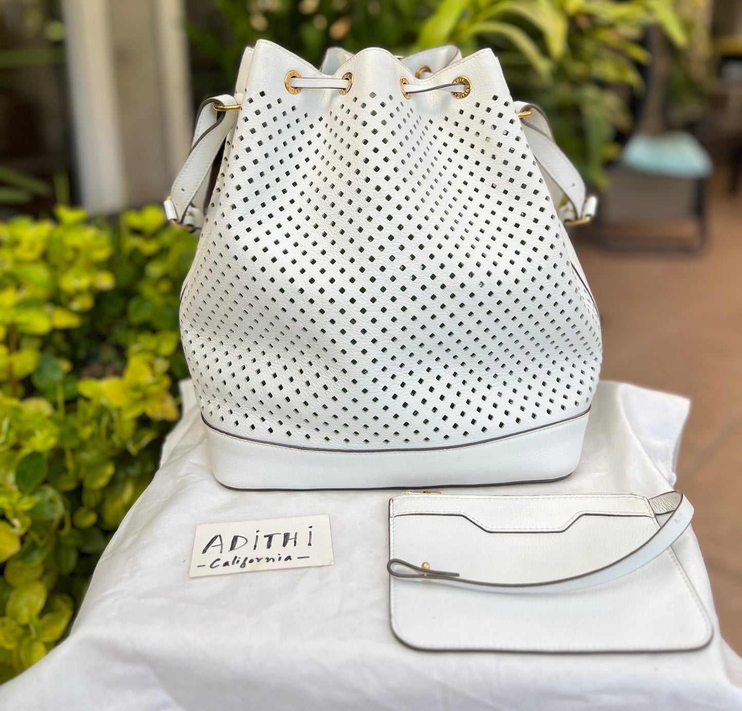 Noe Perforated White with Pouch